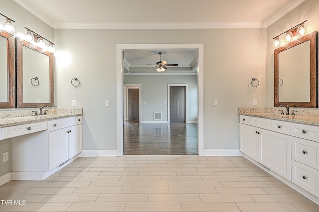 1030 Savin Fls, Gray, TN 37615 - full bathroom featuring ornamental molding, two vanities, ceiling fan, baseboards, and wood finished floors