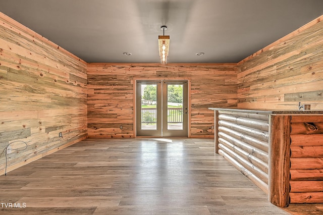 1030 Savin Fls, Gray, TN 37615 - empty room featuring wood walls and wood finished floors