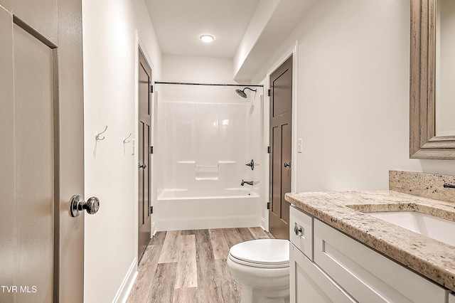 1030 Savin Fls, Gray, TN 37615 - full bath with vanity, wood finished floors, shower / bathtub combination, and toilet