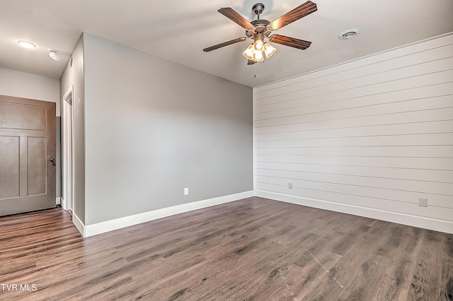 1030 Savin Fls, Gray, TN 37615 - spare room featuring baseboards, dark wood-style flooring, and a ceiling fan