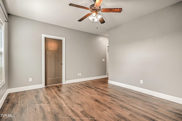 1030 Savin Fls, Gray, TN 37615 - empty room featuring a ceiling fan, wood finished floors, and baseboards
