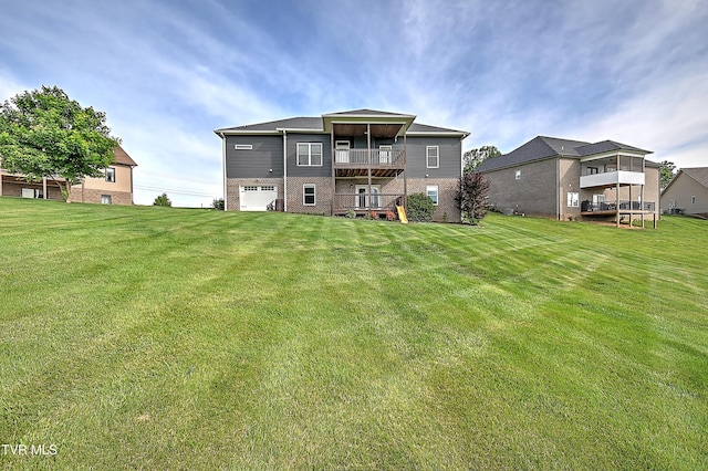 1030 Savin Fls, Gray, TN 37615 - back of property with a balcony, a yard, and brick siding