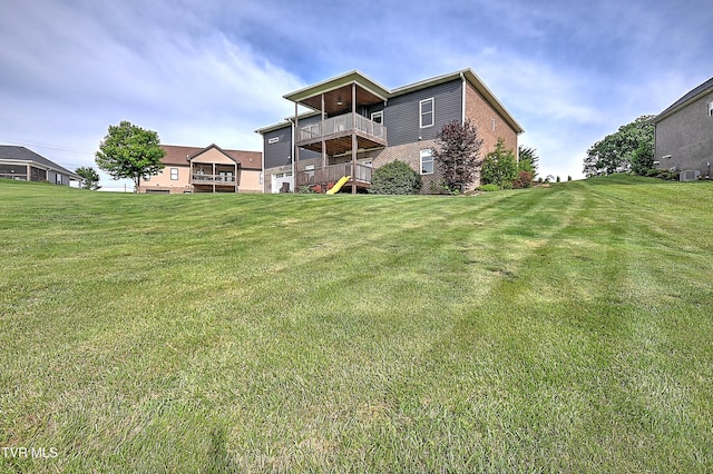 1030 Savin Fls, Gray, TN 37615 - rear view of house with a lawn and brick siding