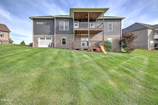 1030 Savin Fls, Gray, TN 37615 - back of property featuring a yard, brick siding, an attached garage, and a balcony