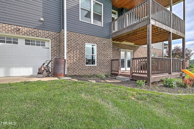 1030 Savin Fls, Gray, TN 37615 - rear view of house with brick siding, a deck, a yard, and a garage