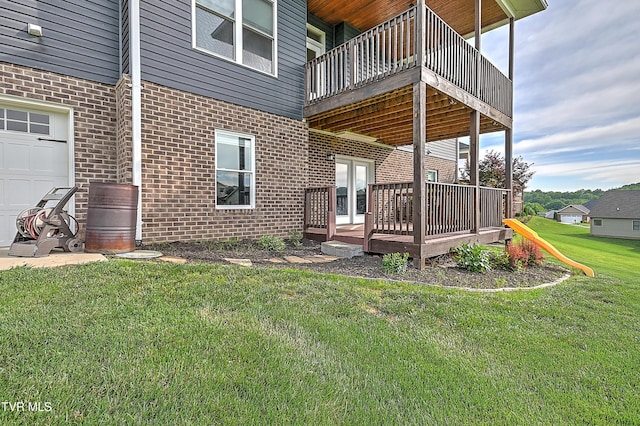 1030 Savin Fls, Gray, TN 37615 - back of house with brick siding, a yard, and a wooden deck