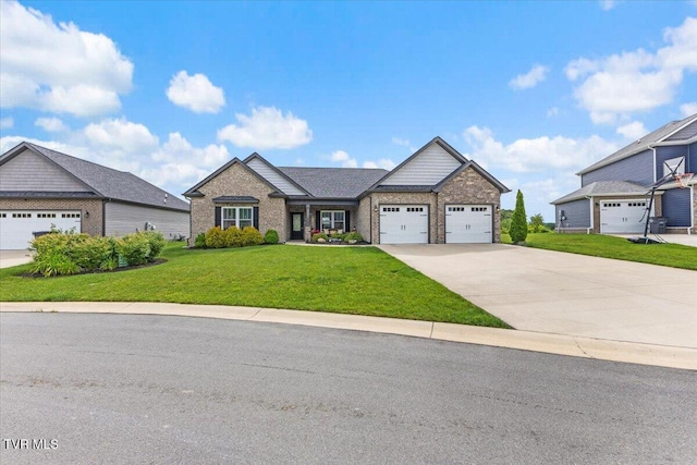 3321 Cottage Green Ct, Kingsport, TN 37664 - view of front of property featuring a garage, a front lawn, concrete driveway, and brick siding