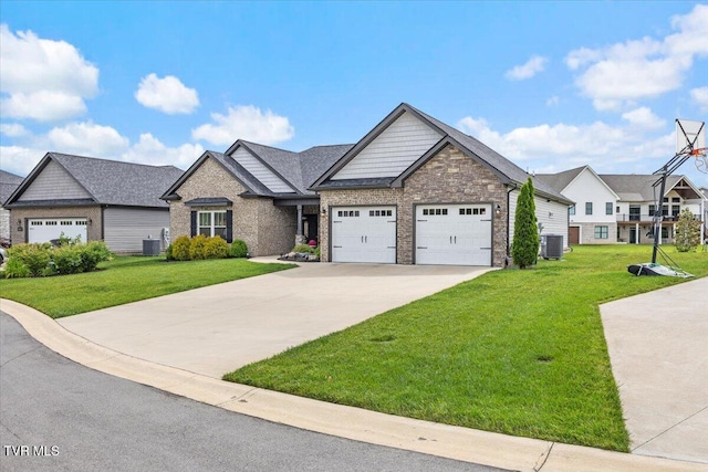 3321 Cottage Green Ct, Kingsport, TN 37664 - craftsman-style house featuring an attached garage, cooling unit, a front lawn, and driveway