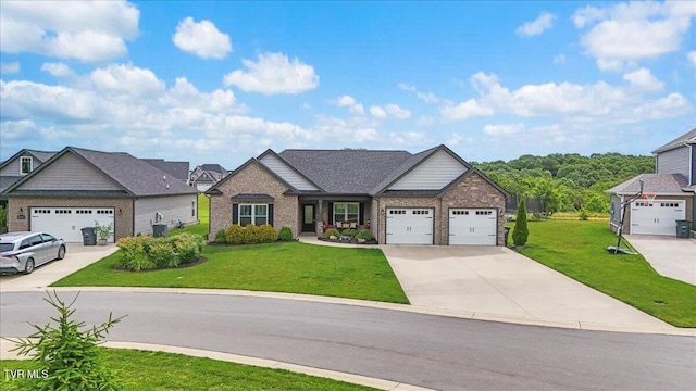 3321 Cottage Green Ct, Kingsport, TN 37664 - craftsman house featuring a front yard, driveway, brick siding, and a garage