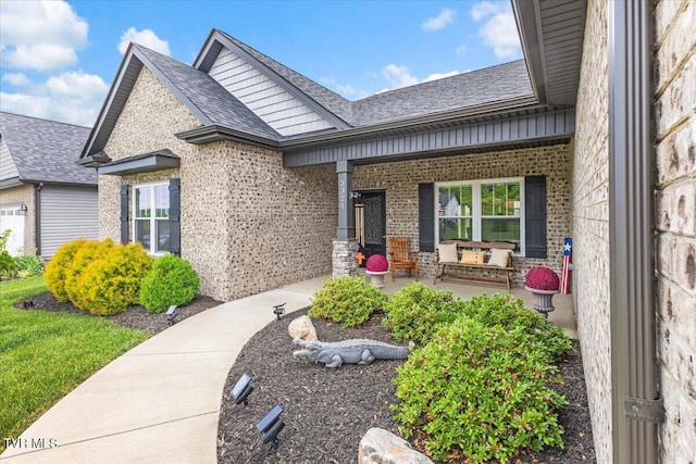 3321 Cottage Green Ct, Kingsport, TN 37664 - view of exterior entry with covered porch, brick siding, and a shingled roof