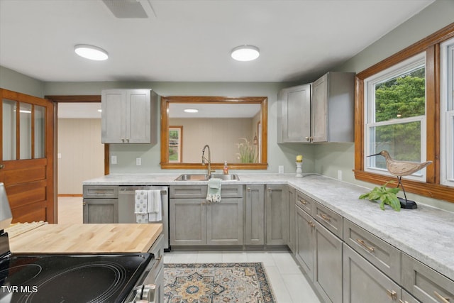 204 Maple Dr, Jonesborough, TN 37659 - kitchen with a sink, range with electric stovetop, dishwasher, gray cabinets, and wooden counters