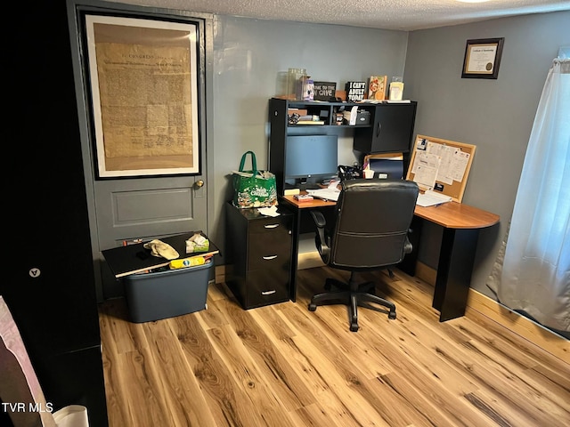 326 Park Ave, Appalachia, VA 24216 - office featuring light wood finished floors and a textured ceiling