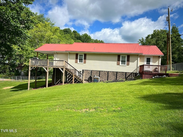 326 Park Ave, Appalachia, VA 24216 - rear view of property featuring a wooden deck, stairs, metal roof, and central air condition unit