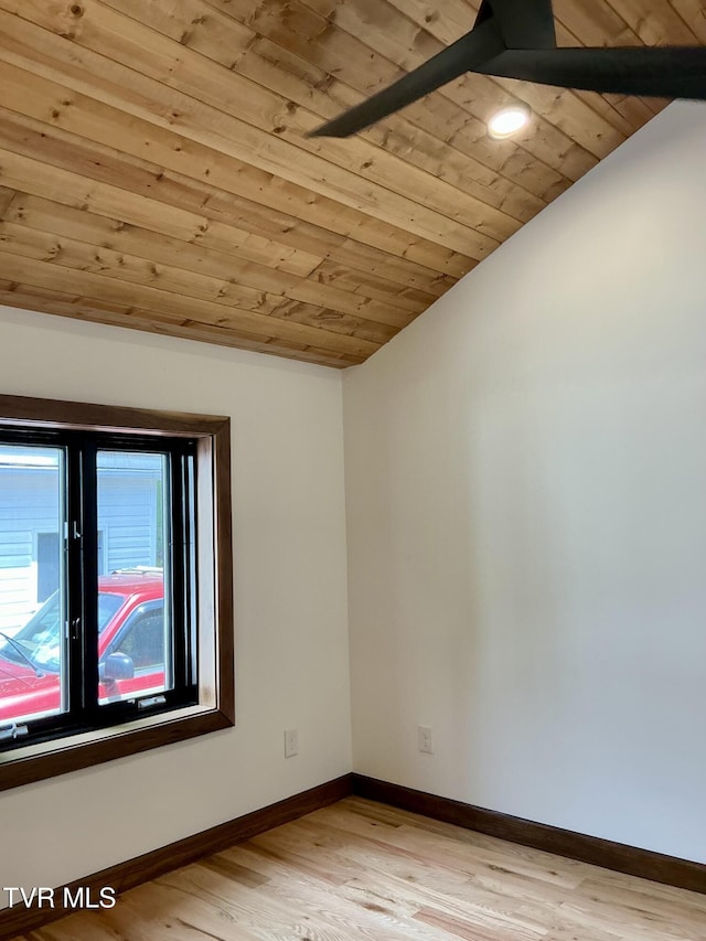 153 Hampton Creek Rd, Roan Mountain, TN 37687 - empty room with wood ceiling, vaulted ceiling, light wood finished floors, and baseboards