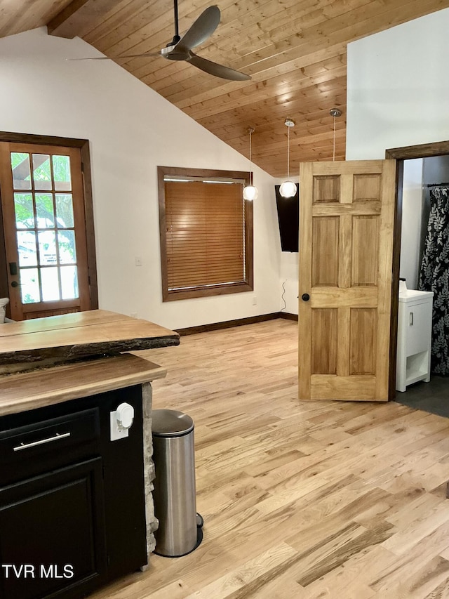 153 Hampton Creek Rd, Roan Mountain, TN 37687 - kitchen featuring wood ceiling, light wood-style flooring, dark cabinets, a ceiling fan, and hanging light fixtures