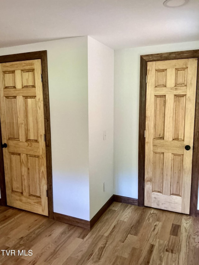 153 Hampton Creek Rd, Roan Mountain, TN 37687 - spare room with wood finished floors and baseboards