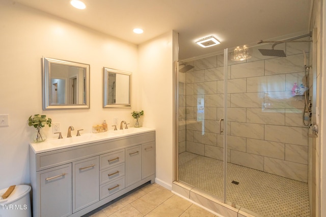 1318 E Lakeview Dr, Johnson City, TN 37601 - bathroom featuring double vanity, a shower stall, tile patterned floors, and recessed lighting