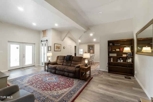 2087 Fodderstack Mountain Loop, Greeneville, TN 37745 - living area featuring recessed lighting, wood finished floors, baseboards, and a barn door