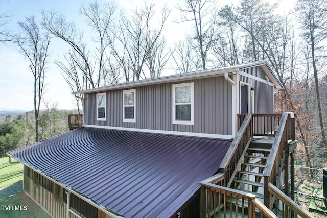 2087 Fodderstack Mountain Loop, Greeneville, TN 37745 - view of property exterior featuring metal roof and stairway