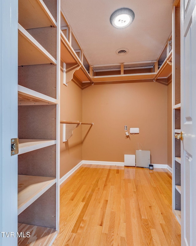 516 Bowmantown Rd, Telford, TN 37690 - walk in closet featuring wood finished floors