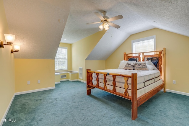 516 Bowmantown Rd, Telford, TN 37690 - carpeted bedroom with a textured ceiling, vaulted ceiling, multiple windows, baseboards, and a ceiling fan