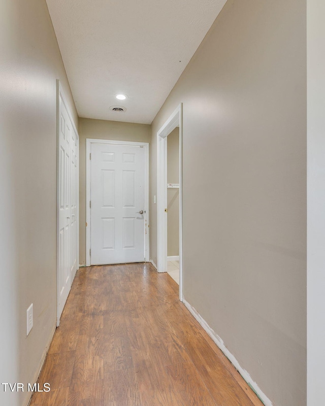 516 Bowmantown Rd, Telford, TN 37690 - hallway with baseboards and wood finished floors