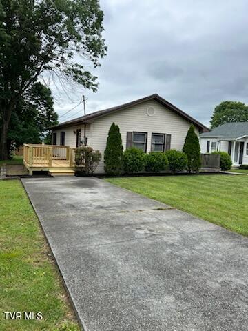 1657 Redwood Dr, Kingsport, TN 37664 - view of front of property with a wooden deck, a front lawn, and concrete driveway
