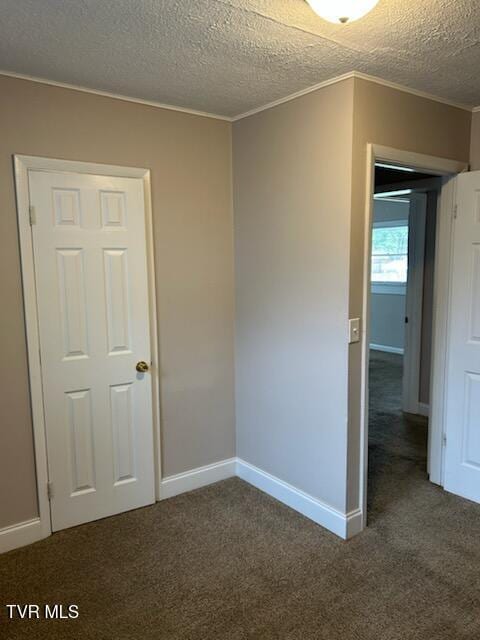 1657 Redwood Dr, Kingsport, TN 37664 - carpeted empty room featuring crown molding, baseboards, and a textured ceiling