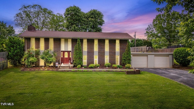 206 Windmere Pl, Kingsport, TN 37663 - greek revival inspired property featuring driveway, a chimney, brick siding, and a garage
