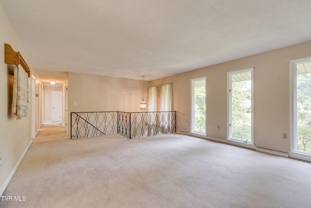 206 Windmere Pl, Kingsport, TN 37663 - spare room featuring carpet flooring, plenty of natural light, and baseboards