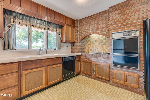 206 Windmere Pl, Kingsport, TN 37663 - kitchen featuring dishwasher, stainless steel oven, a sink, tile countertops, and a warming drawer