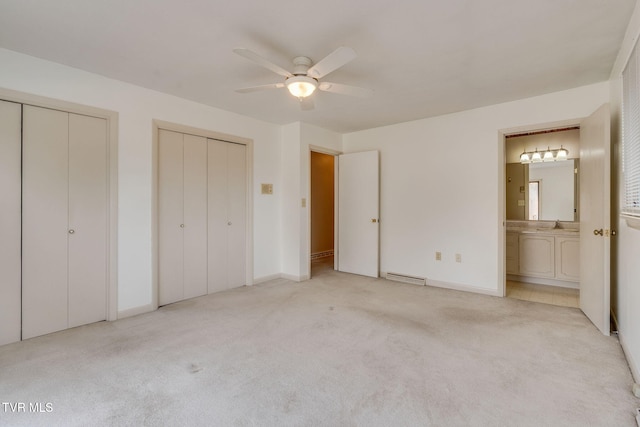 206 Windmere Pl, Kingsport, TN 37663 - unfurnished bedroom featuring two closets, carpet, ensuite bathroom, and baseboards