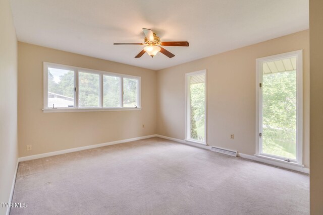 206 Windmere Pl, Kingsport, TN 37663 - carpeted spare room featuring a ceiling fan and baseboards