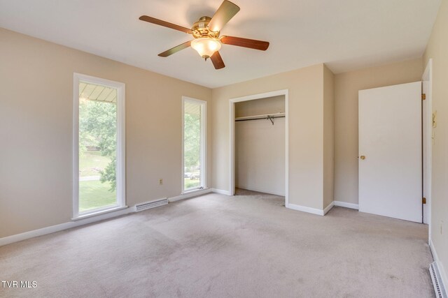 206 Windmere Pl, Kingsport, TN 37663 - unfurnished bedroom featuring light colored carpet, a closet, and baseboards