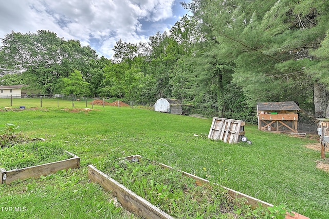 481 Pleasant Hill Rd, Blountville, TN 37617 - view of yard with an outbuilding, a garden, and exterior structure