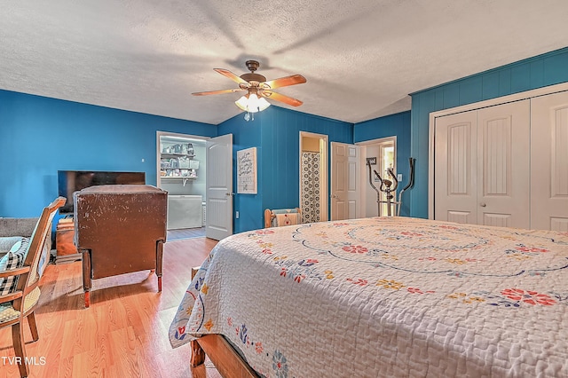 481 Pleasant Hill Rd, Blountville, TN 37617 - bedroom with light wood-type flooring, a closet, a textured ceiling, and a ceiling fan