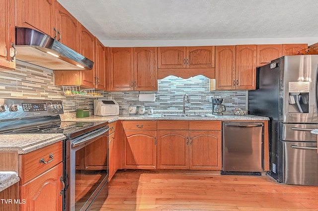 481 Pleasant Hill Rd, Blountville, TN 37617 - kitchen with range with electric stovetop, under cabinet range hood, a sink, stainless steel dishwasher, and refrigerator with ice dispenser