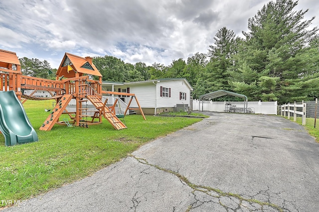 481 Pleasant Hill Rd, Blountville, TN 37617 - view of front of property with a carport, driveway, and a playground