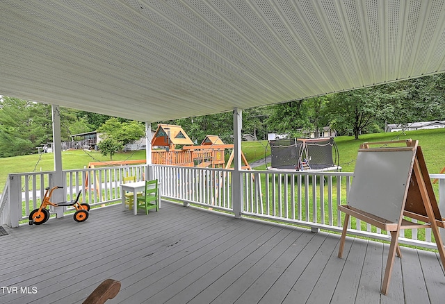 481 Pleasant Hill Rd, Blountville, TN 37617 - wooden terrace with a trampoline, a playground, and a lawn