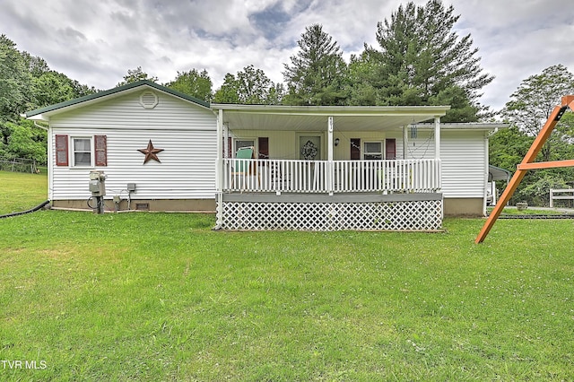 481 Pleasant Hill Rd, Blountville, TN 37617 - manufactured / mobile home featuring covered porch, a front yard, and crawl space