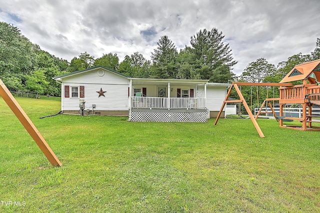 481 Pleasant Hill Rd, Blountville, TN 37617 - back of house with a playground, a lawn, a porch, and crawl space
