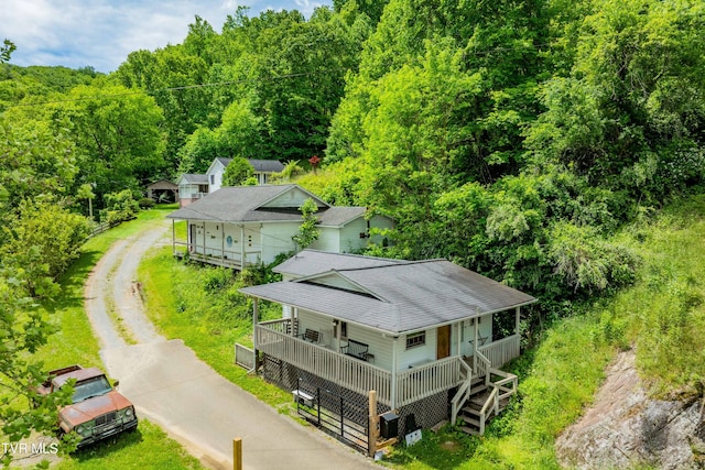 402 Crabtree Rd, Roan Mountain, TN 37687 - aerial view of property and surrounding area with a heavily wooded area