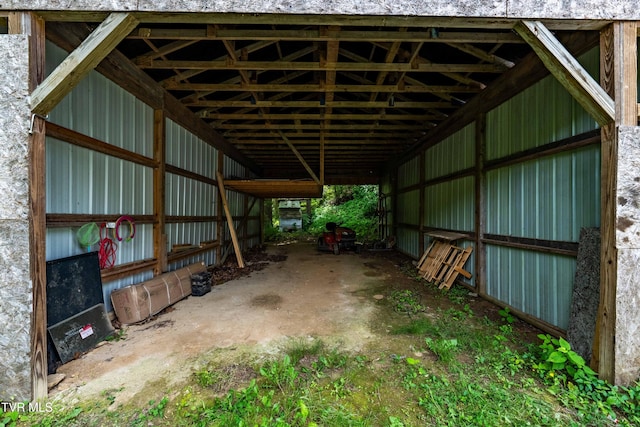 402 Crabtree Rd, Roan Mountain, TN 37687 - garage featuring a carport