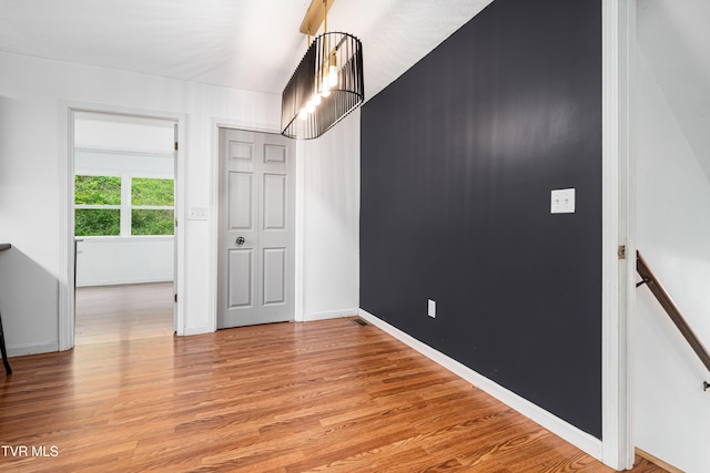 402 Crabtree Rd, Roan Mountain, TN 37687 - spare room featuring light wood-style flooring and baseboards