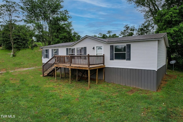 1830 Dover Rd, Morristown, TN 37813 - rear view of property with a wooden deck, a lawn, metal roof, and stairs