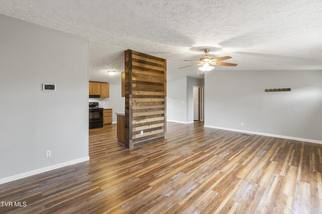 1830 Dover Rd, Morristown, TN 37813 - unfurnished living room with a textured ceiling, a ceiling fan, baseboards, and wood finished floors