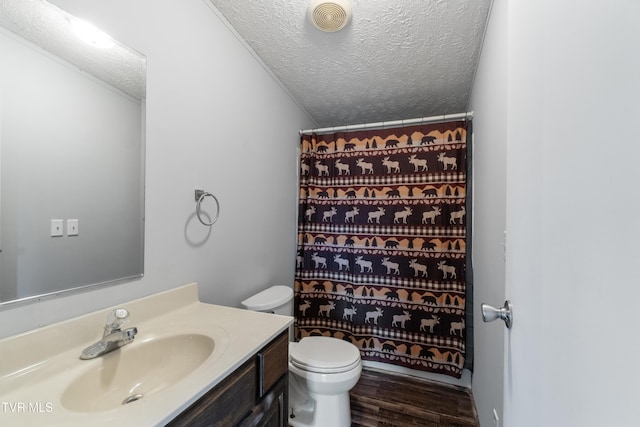 1830 Dover Rd, Morristown, TN 37813 - bathroom with vanity, a textured ceiling, wood finished floors, toilet, and curtained shower