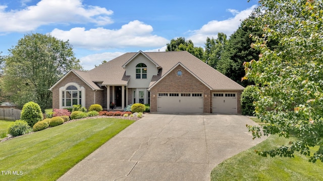 5 Carriage Ct, Johnson City, TN 37604 - traditional-style home with brick siding, concrete driveway, a garage, and a front yard
