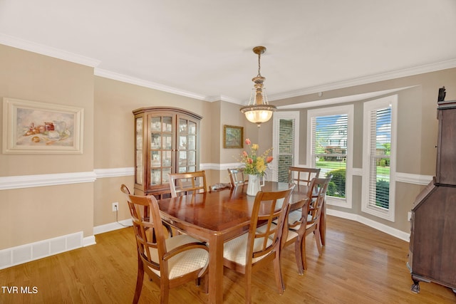 5 Carriage Ct, Johnson City, TN 37604 - dining room featuring light wood-type flooring, baseboards, and crown molding