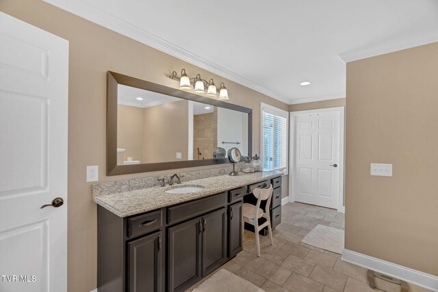 5 Carriage Ct, Johnson City, TN 37604 - bathroom with vanity, baseboards, ornamental molding, recessed lighting, and stone finish floors